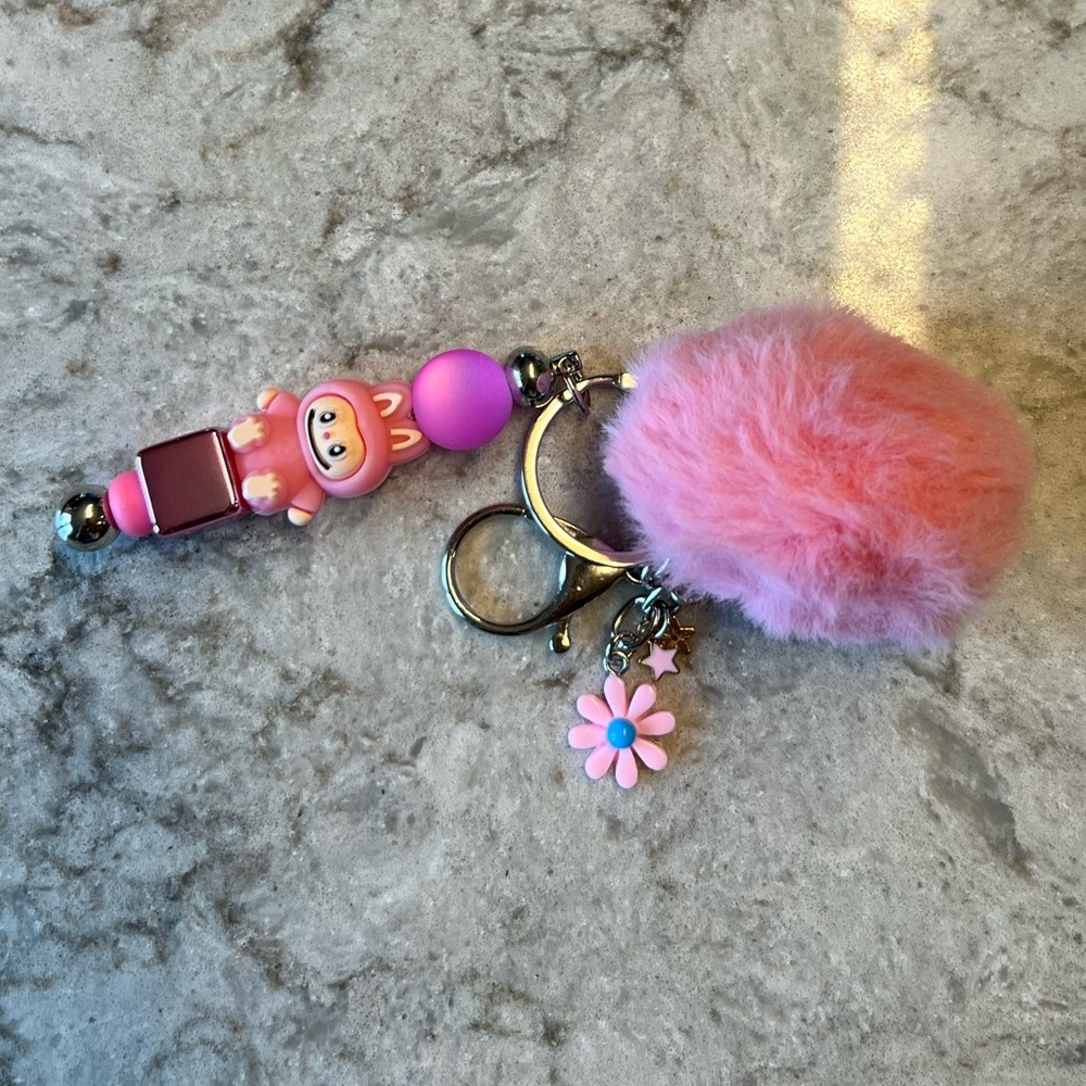 Pink Silicone Labubu Keychain with Pom Pom and Floral Accent - Picture 3 of 8